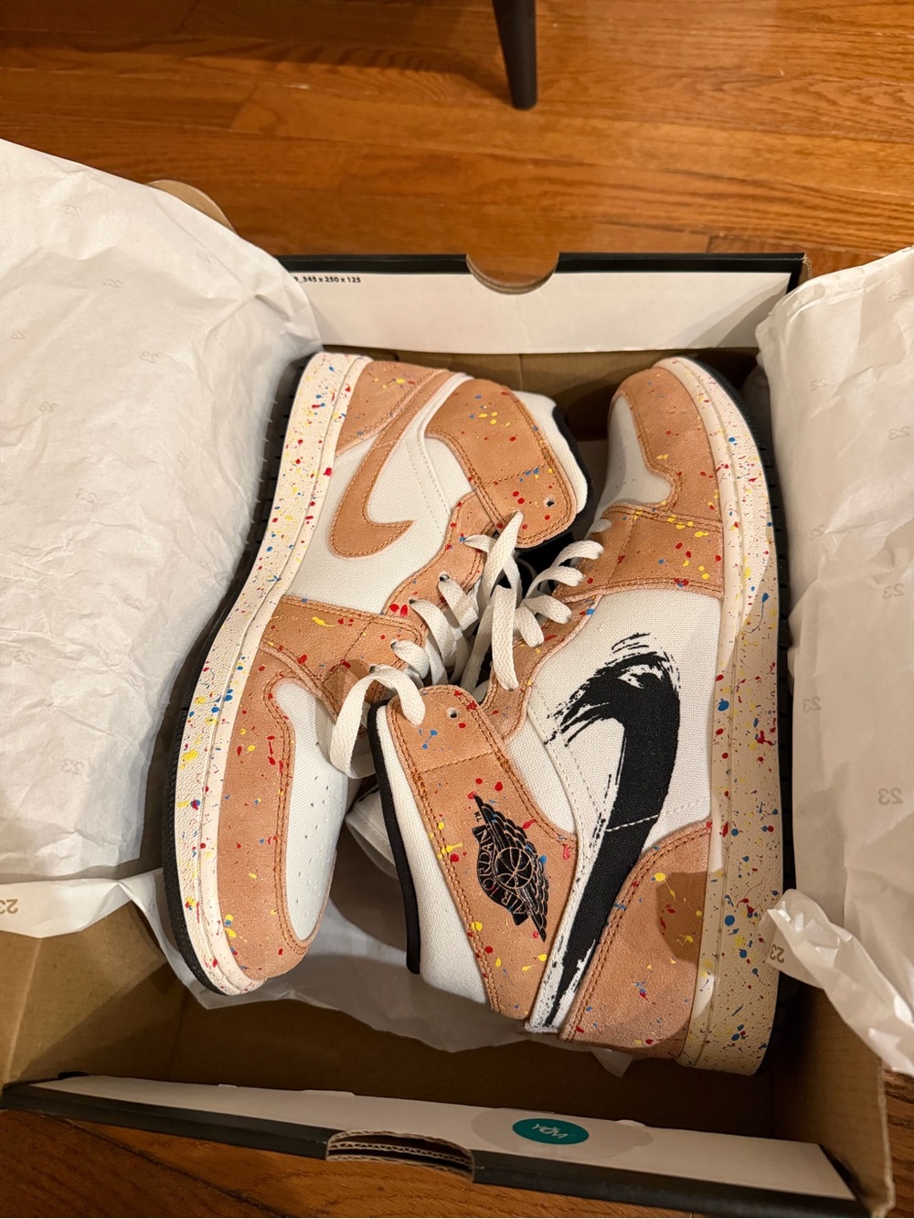 Jordan 1 Mid SE sneakers in sail/black-cider red.